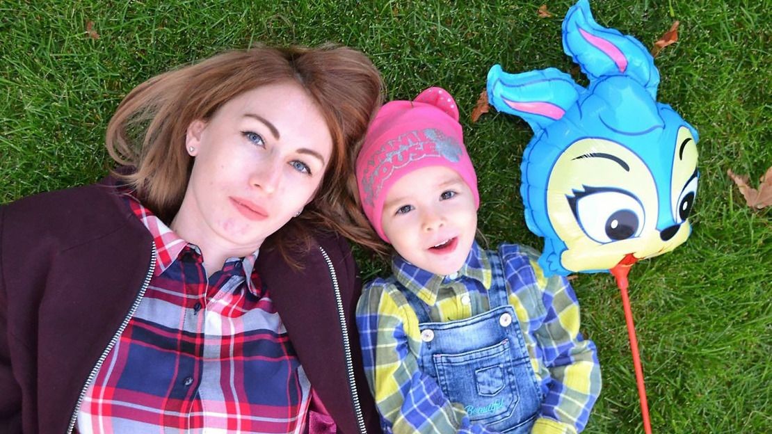 Antonina and her daughter Varvara pictured in the park near Drama Theatre in Mariupol before the escalation of the war.; }}