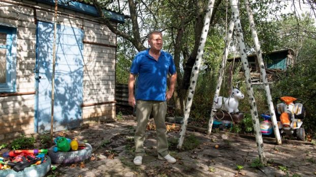 Mr. Volodymyr pictured in the yard of his home near the village of Zarazhne in Kharkiv Oblast. In February 2022 he was injured in a cluster munition strike on Kharkiv city and now has no feeling below his left thigh as a result of nerve damage. The strike, he says, was the first instance of cluster munitions in the war. When you are injured from cluster munitions he says, there is no end. He is a beneficiary of HI with cash assistance. Mr. Volodymyr pictured in the yard of his home near the village of Zarazhne in Kharkiv Oblast. In February 2022 he was injured in a cluster munition strike on Kharkiv city and now has no feeling below his left thigh as a result of nerve damage. The strike, he says, was the first instance of cluster munitions in the war. When you are injured from cluster munitions he says, there is no end. He is a beneficiary of HI with cash assistance.; }}